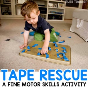 ANIMAL TAPE RESCUE - A quick and easy toddler activity; taby activity; taby activities; easy activity for one year old; baby activity; airplane ride activity; animal activity; rainy day activity; easy indoor activity from Busy Toddler