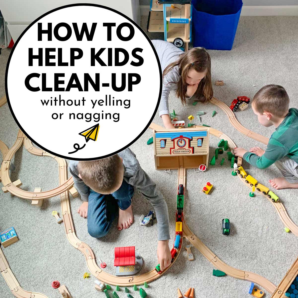 How to help kids clean-up without yelling or nagging: image shows three kids on gray carpet playing with trains.