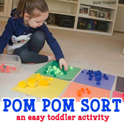 POM POM COLOR SORT: Check out this easy indoor activity that toddlers will love! A quick and easy toddler activity; color learning activity; color sorting activity; pom pom activity from Busy Toddler