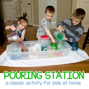 RAINBOW POURING STATION: A quick and easy kids activity that holds little attention spans - this is the best indoor activity for kids stuck at home. A great indoor activity for toddlers and preschoolers - kids love playing with water in this activity from Busy Toddler
